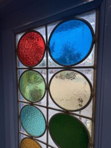 Coloured glass roundels close up 2