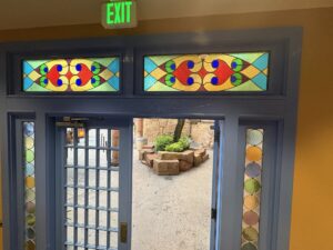 Doorway with roundel panels and two transoms