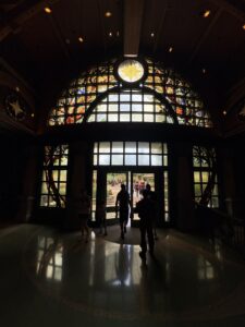 Entrance hall with a domed multicoloured window above double doors