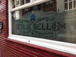 Etched window with lettered banner seen from the side