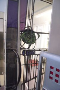 Green glass rose in leaded door panel side view