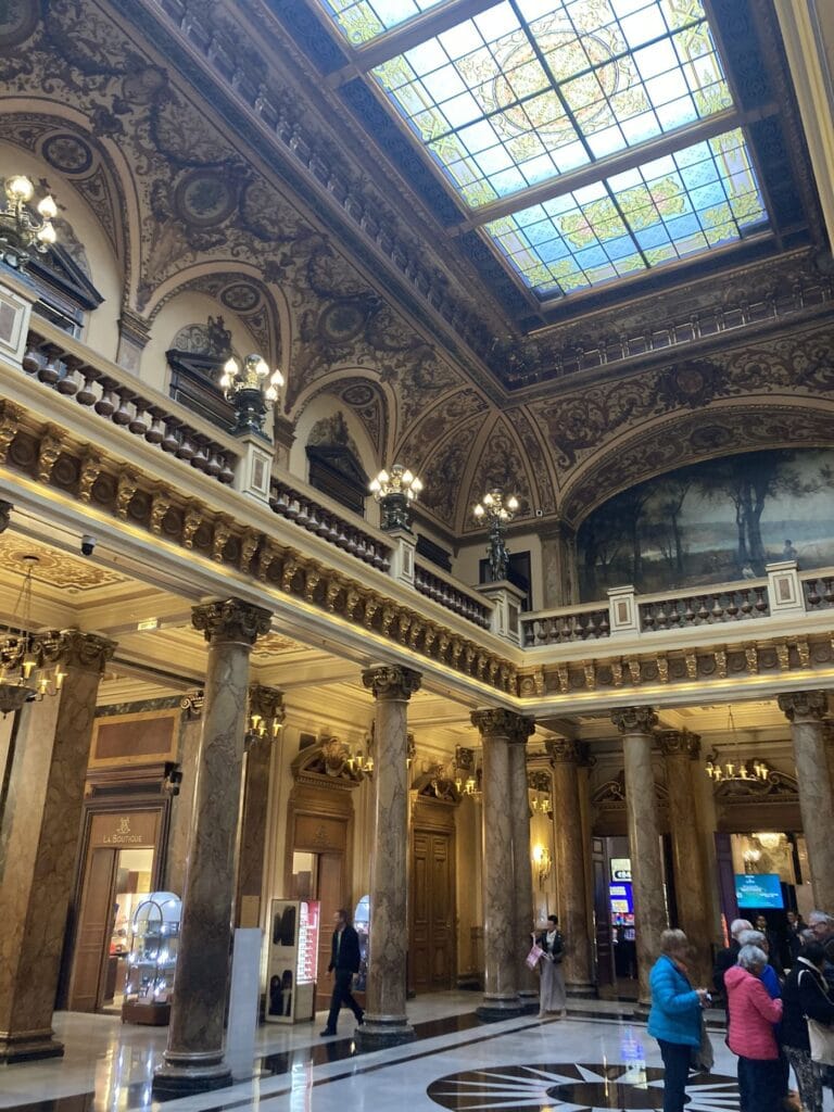 Hall with stained glass roof light and columns