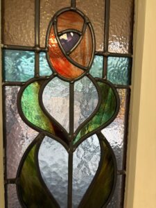 Mackintosh rose door panel close up green leaves