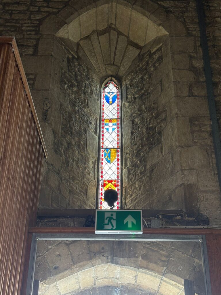 Narrow lancet window with coloured stained glass, Chippenham