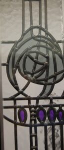 Mackintosh style rose panel in overlay stained glass on textured glass