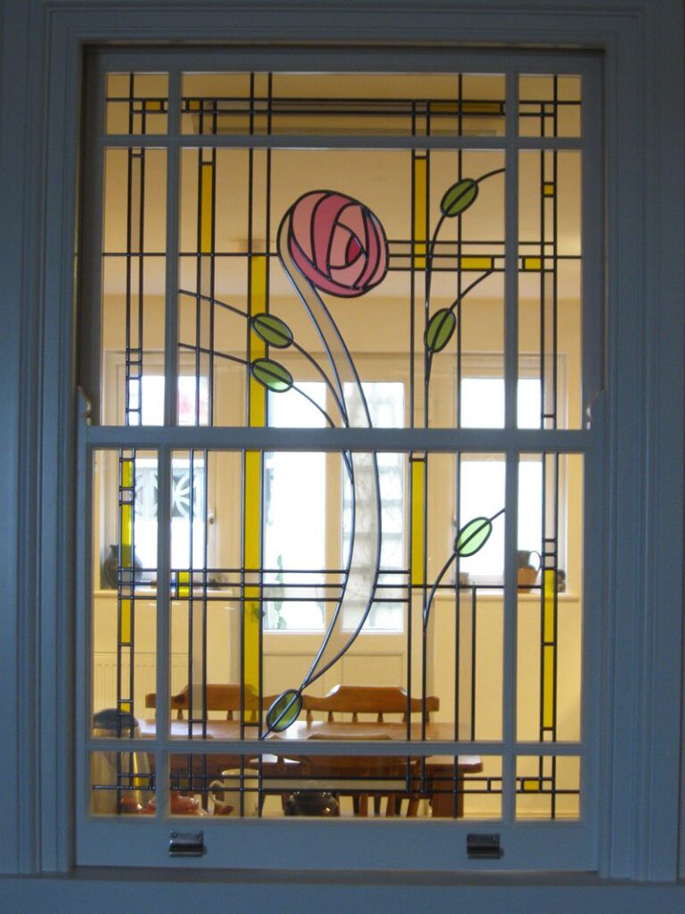Rose window in the Mackintosh style made in overlay stained glass