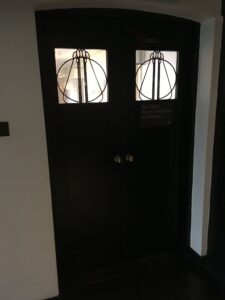 Pair of Black Doors with Two Small Leaded Glass Panels, Leaded Lights