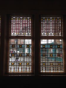 Pair of windows with geometric leaded panels