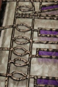 Purple drops and loops close up overlay
