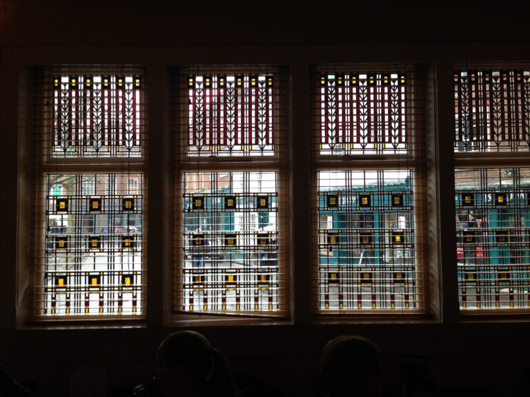 Row of windows with geometric leaded panels