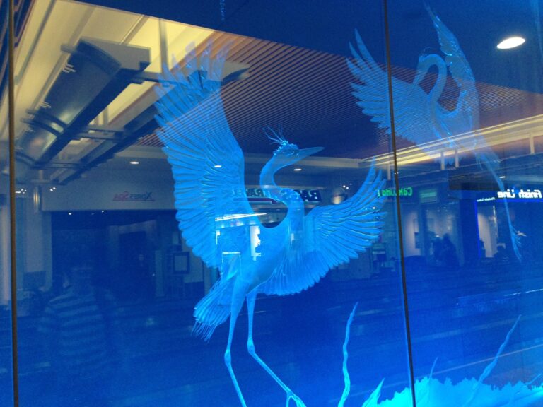 Sandblasted glass deep carved heron panel