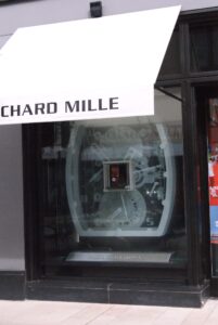 Shop front with sandblasted watch case window