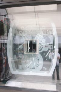 Shop window with large sandblasted watch case design 2