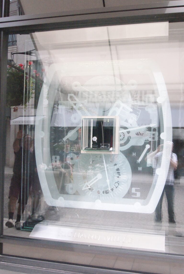 Shop window with large sandblasted watch case design
