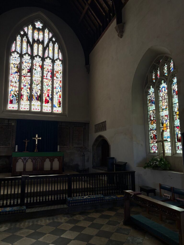 Side chapel with two stained glass windows and an altar, Chippenham
