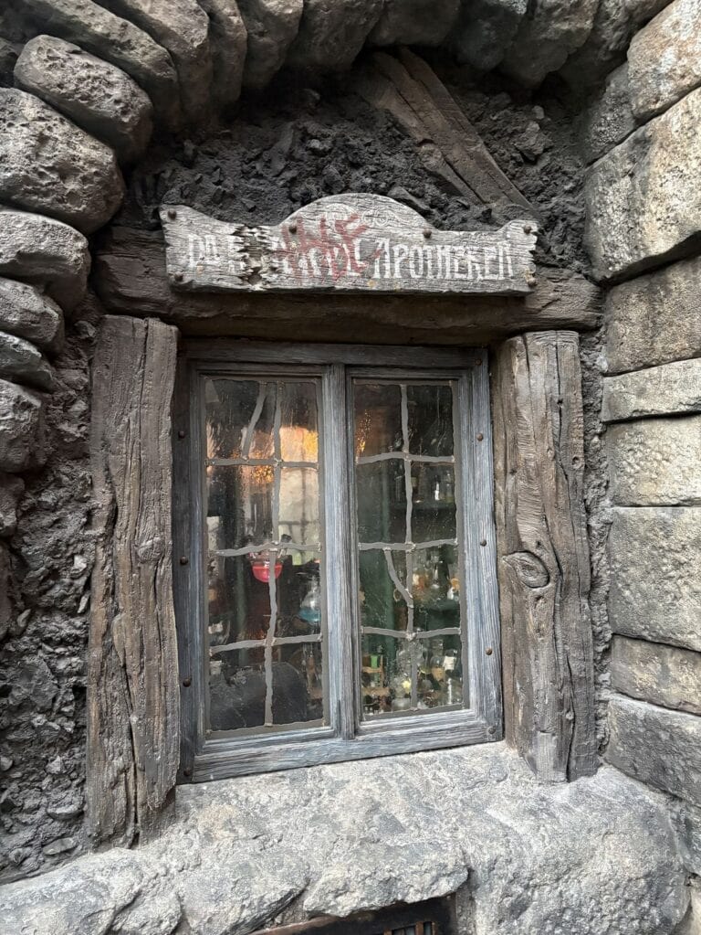 Small window with leaded square panes set in stone