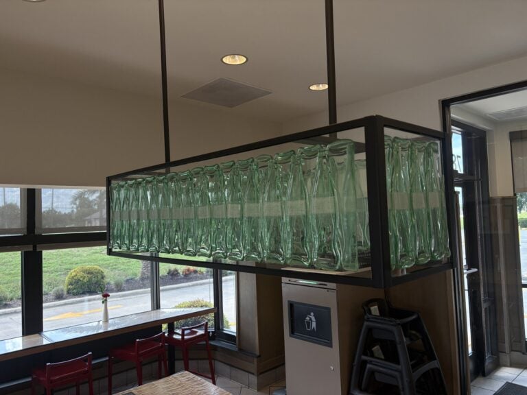 Suspended glass light box of bottle shapes