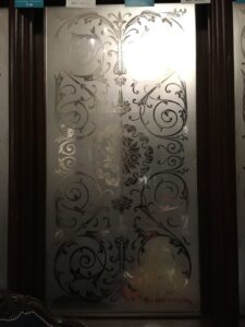 Tall etched door panel with scrolls and foliage