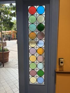 Tall side panel of coloured roundels