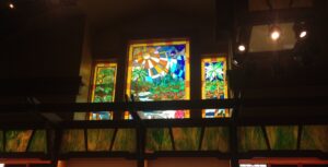 Tropical sunburst window with two side panels