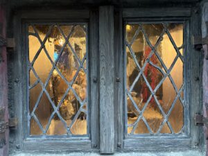 Weathered casement windows with diamond leaded lights 2