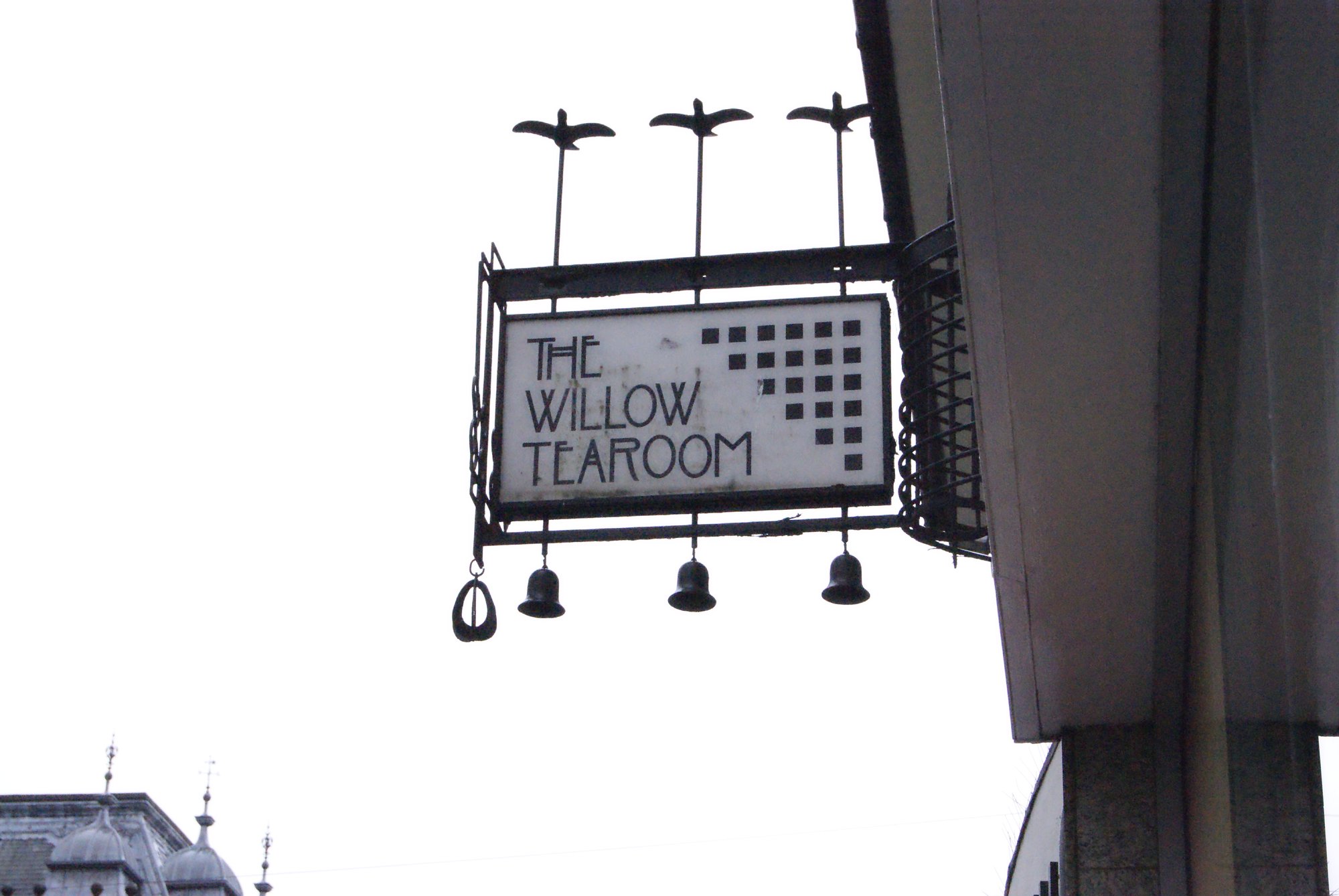 Hanging sign reading The Willow Tearoom outside the Willow Tea Rooms in Glasgow, photographed in 2013