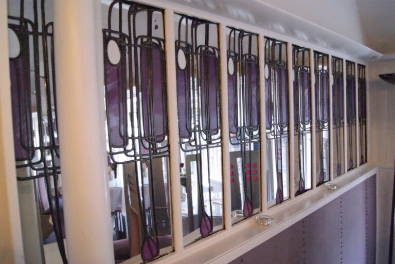 Row of tall leaded windows seen from inside the Willow Tea Rooms, photographed in 2013