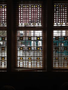 Windows with geometric leaded panels from the side